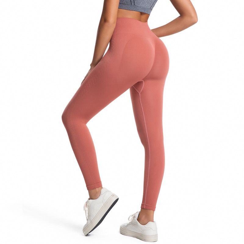 Cross border hot selling solid color sexy peach hip lifting yoga pants with high waist and tight fitting running and fitness pants in Europe and America black S