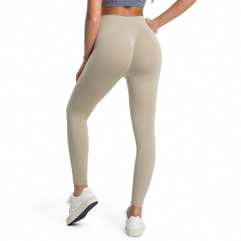 Cross border hot selling solid color sexy peach hip lifting yoga pants with high waist and tight fitting running and fitness pants in Europe and America black S