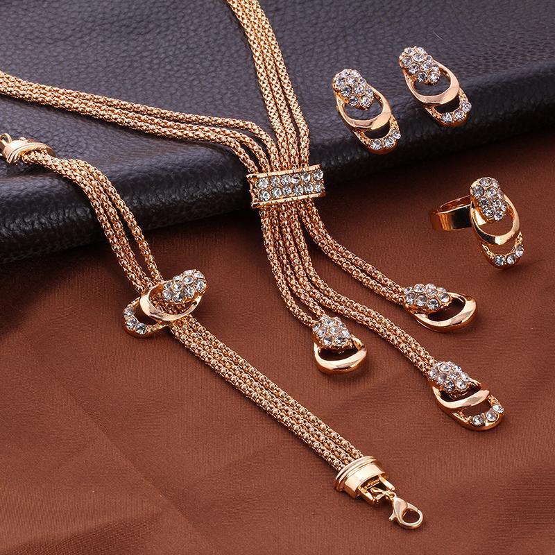 Cross border hot selling gold-plated exaggerated crystal jewelry set creative bridal diamond necklace earrings ring four piece set DD466 AS PICTURE
