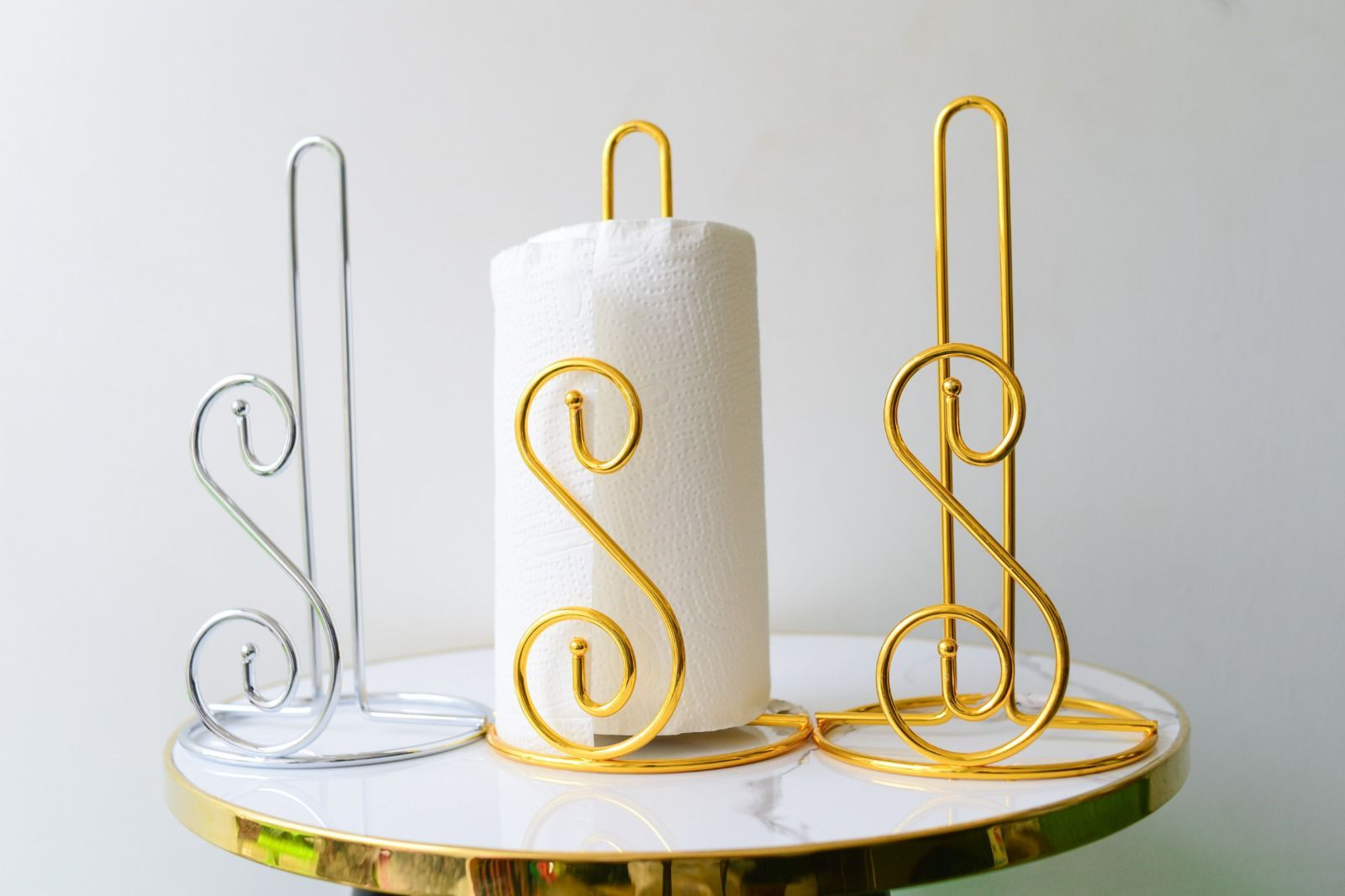 ▪️✔️Stainless Steel Serviette Roll Holder-Golden-Silver▪️✔️  Modern design free standing chrome toilet paper kitchen roll holder.

    High Quality.

    Material: Stainless Steel Chrome.

    Free St