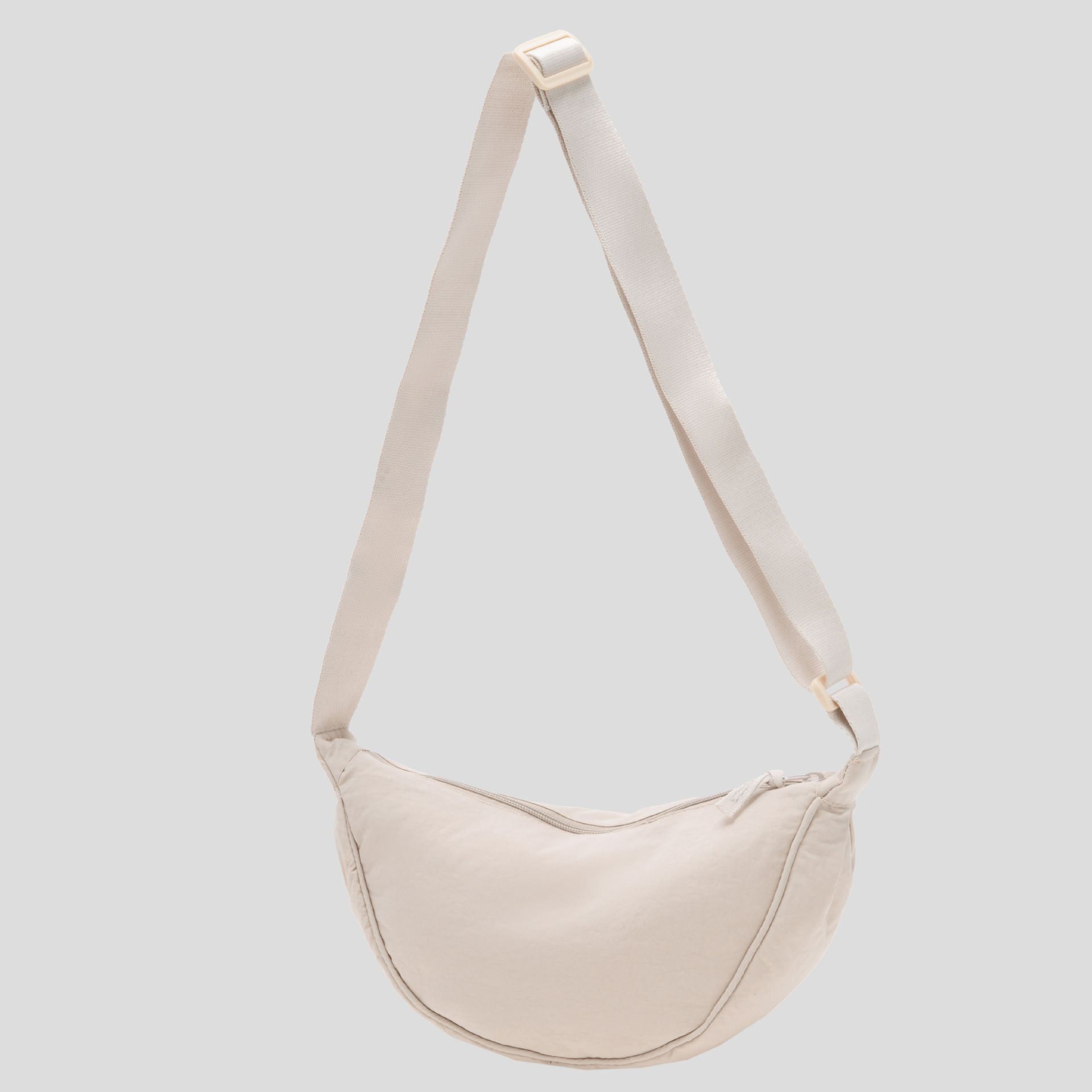 2025 hot selling nylon crescent crossbody bag is suitable for women's bag trendy men's bag, small travel sling bag for the homeless rice white F