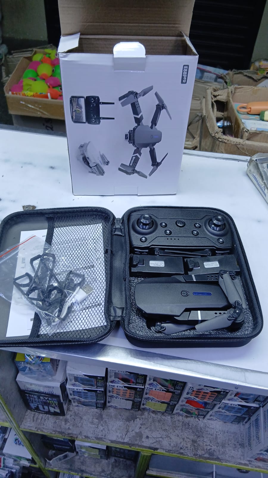 E88/E99 TOY Drone — Fun Takes Flight

Experience the thrill of flying with the E88/E99 Toy Drone — built for smooth control, stable flight, and endless excitement. Lightweight yet durable, it’s perfec