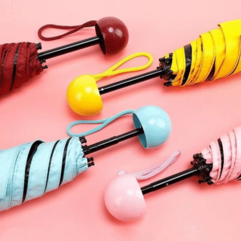Cute Capsule umbrella Mini Small Pocket Capsule Umbrella Foldable Compact Pocket Umbrella This excellent umbrella is the perfect combo of portability, protection and durability.