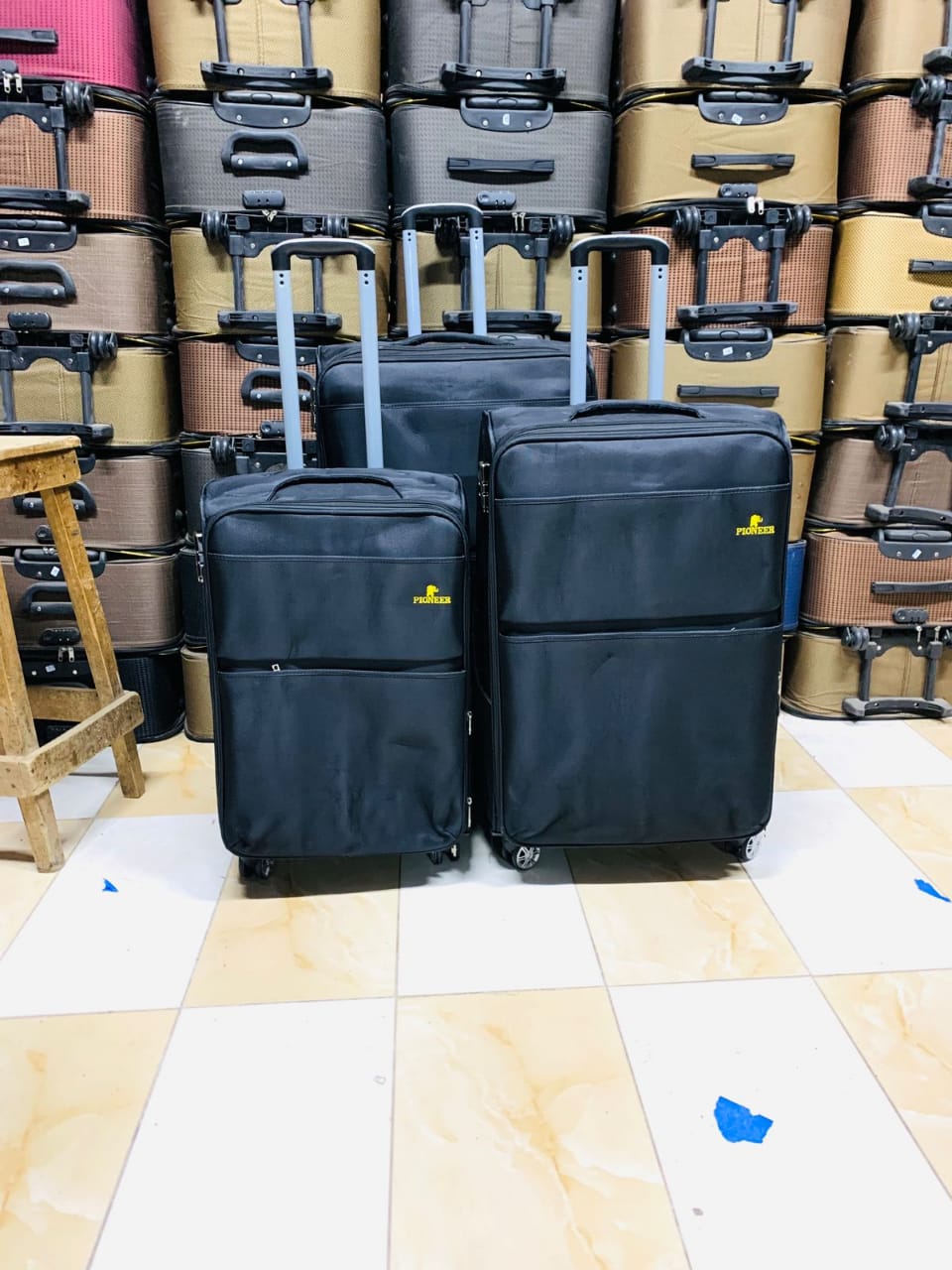 3 IN 1 Fabric LAXURIOUS  SUITCASE BRIEFCASE TRAVEL BAG.Strong and durable suitcase

Made of tough fabric

Has four rotating wheels on each piece

Strong handle that is easy to push and pull

Has a pol