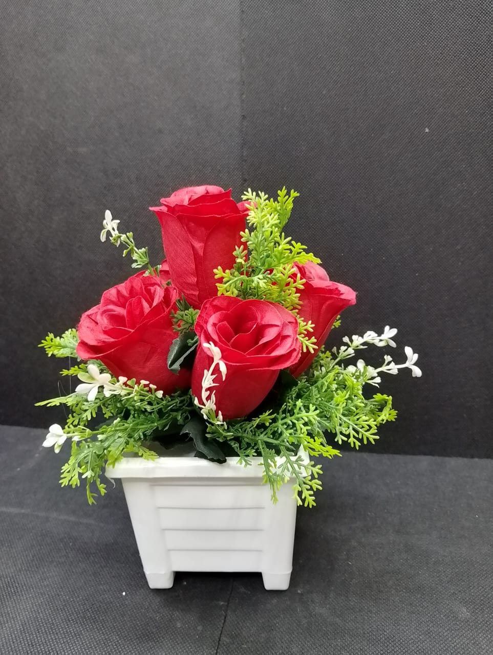 Table Top Artificial Rose Flower..Artificial flowers/plants add a luxurious touch to your interior setting and the same time, it is a zero maintenance. Its arrangement ideas lights up your living spac