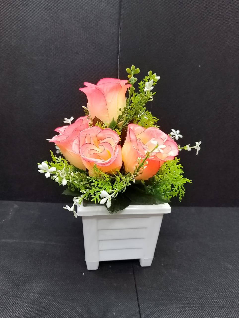 Table Top Artificial Rose Flower..Artificial flowers/plants add a luxurious touch to your interior setting and the same time, it is a zero maintenance. Its arrangement ideas lights up your living spac