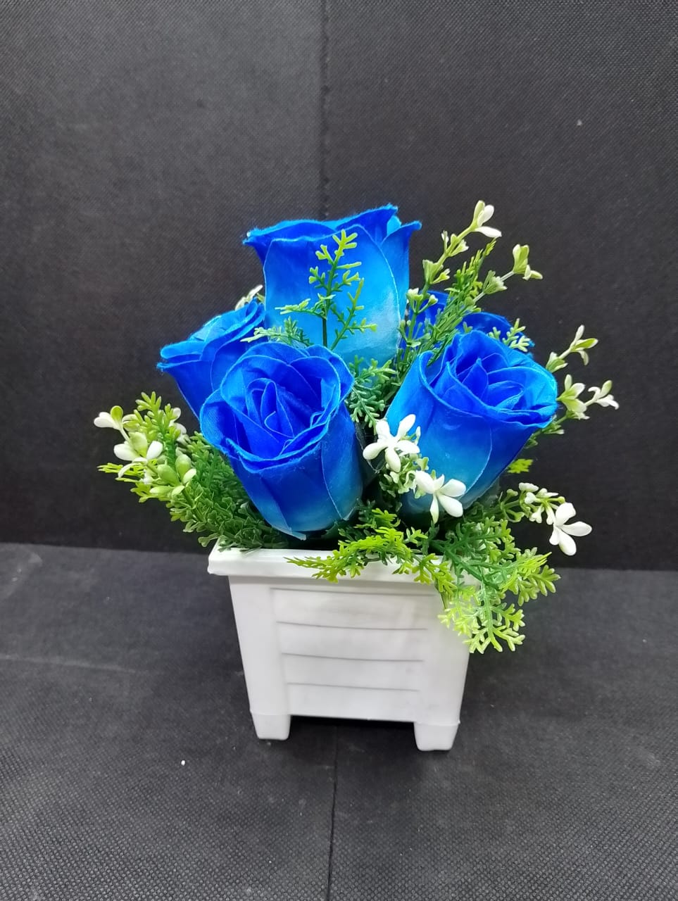 Table Top Artificial Rose Flower..Artificial flowers/plants add a luxurious touch to your interior setting and the same time, it is a zero maintenance. Its arrangement ideas lights up your living spac