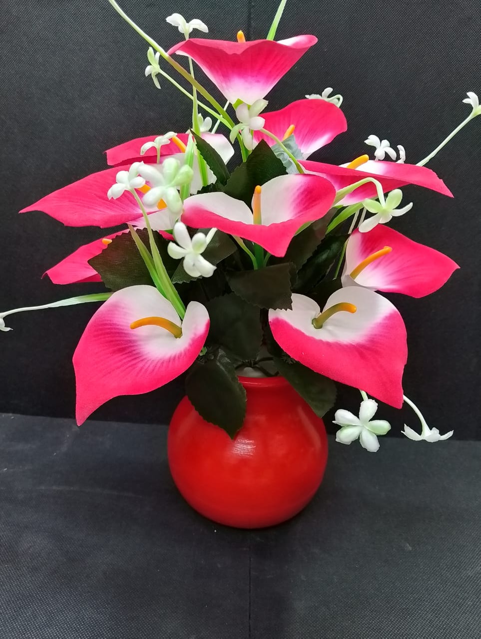 Artificicial Bail Table Top Flower  This beautifully piece adds a touch of nature and elegance to any room, creating a soothing and inviting atmosphere. The realistic design makes it a perfect piece f