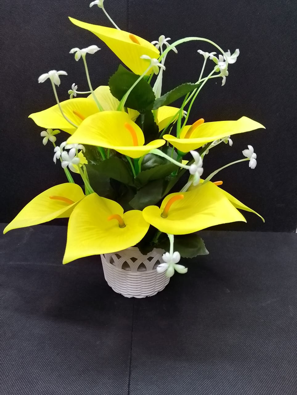 Artificicial Bail Table Top Flower  This beautifully piece adds a touch of nature and elegance to any room, creating a soothing and inviting atmosphere. The realistic design makes it a perfect piece f