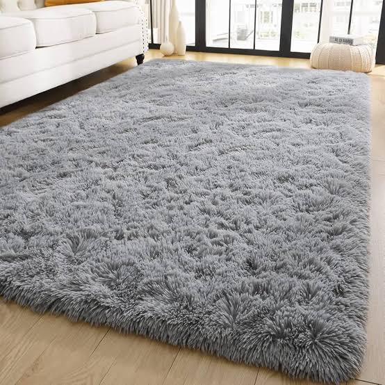 Soft fluffy carpets. Its woolen shag rug made of cotton material and a thick surface the ideal carpet for your home that will give you value for your money.5by8  t is very soft for a warm and cozy liv