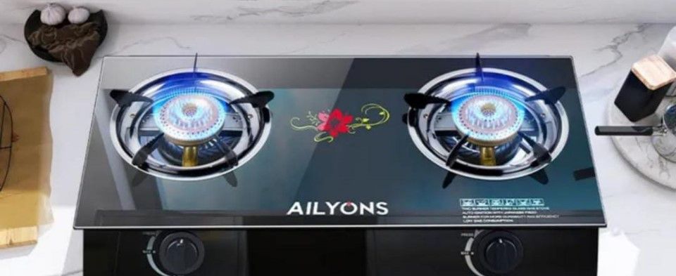 [ SHOP AT DISCOUNTED PRICE  ]. AILYONS Glass Table Top Double Burner Gas Stove + Pipe & Regulator.2-burner, Tampered glass top
Strong Galvanized steel
Auto ignition system
Whirlwind Technology 
New st