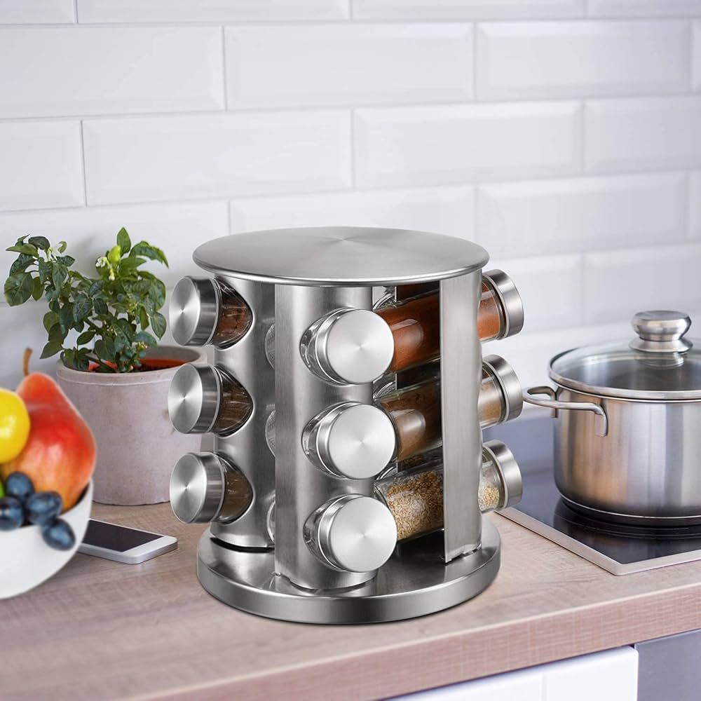 revolving spice rack. It features a 360-degree rotating base for easy access to spices. The rack is made of stainless steel and includes glass jars. It is designed to maximize counter space and keep