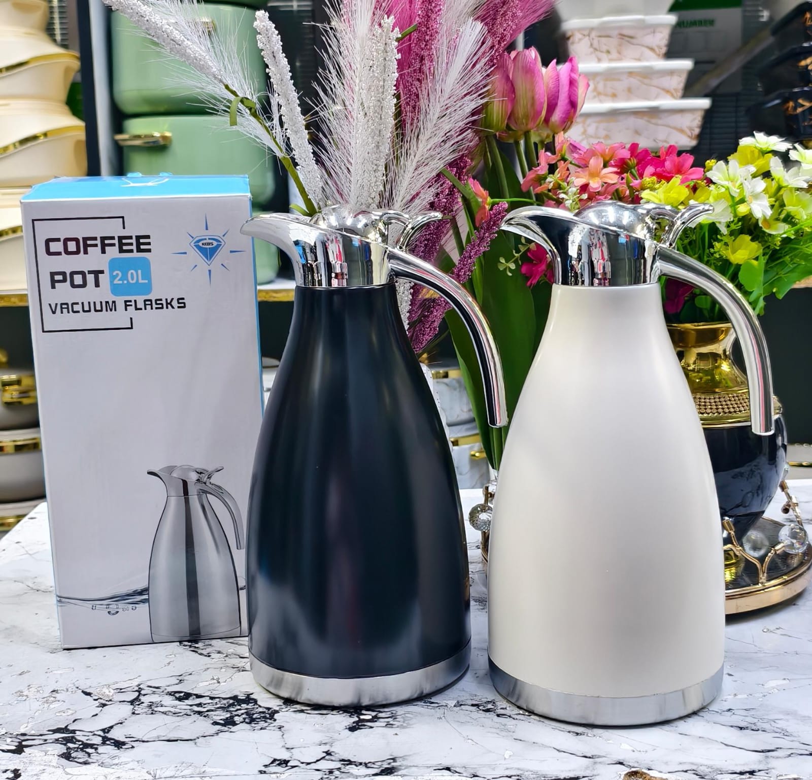 Nice One Stainless Steel Vacuum Flask High-Quality Thermos - 2.0L🎉🥳 your ideal companion for keeping beverages hot or cold for extended periods. This 2.0-liter vacuum flask is crafted from high-qual