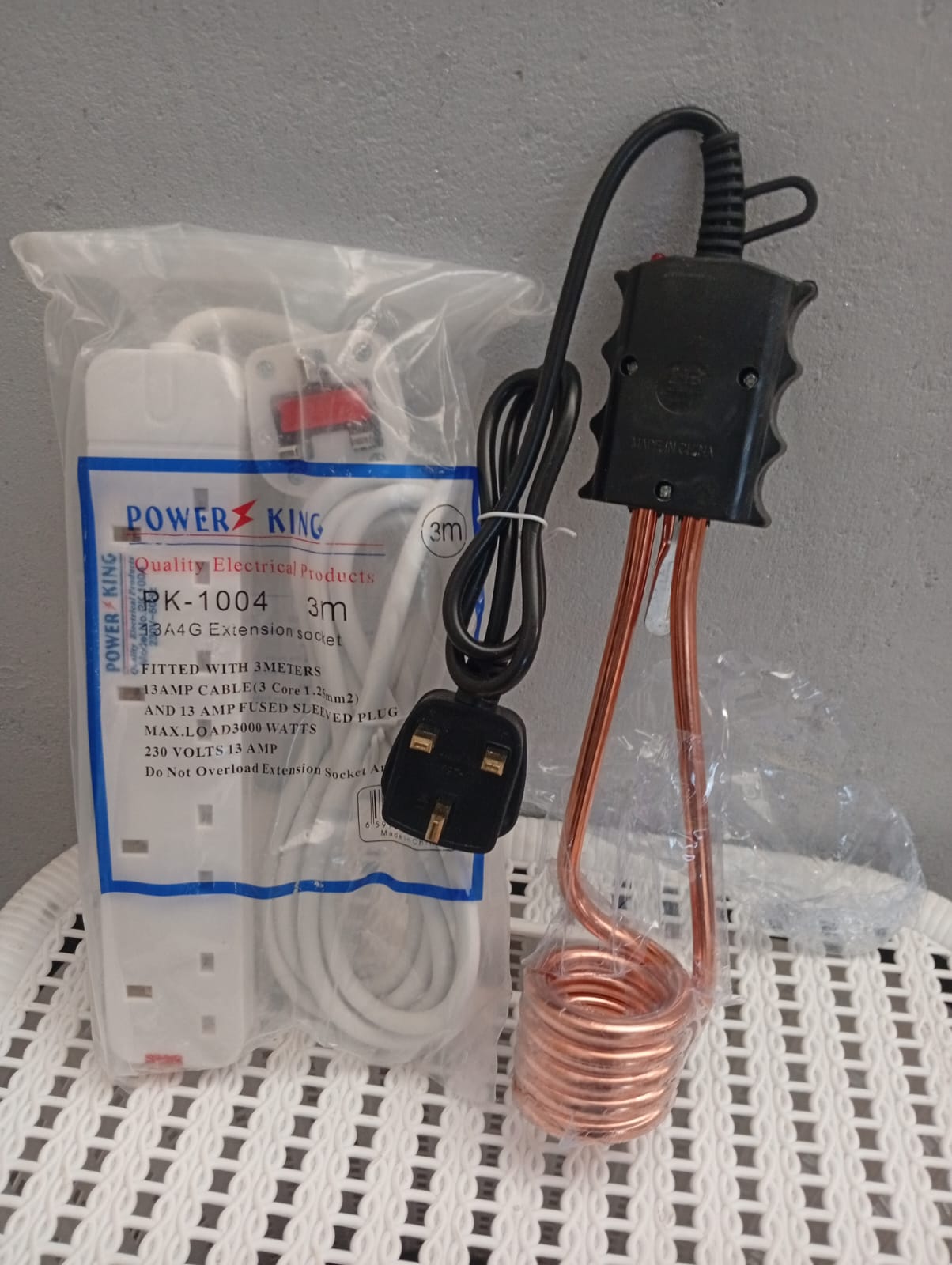 Electric Stainles Water Heater Immersion Coil+ Free 4 Way Extension Cable. The immersion heater is a compact device with a stainless steel coil that heats water directly inside a container. It is desi