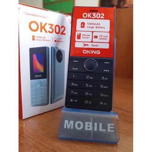 RESTOCKED👀👀Oking Ok302 DUAL SIM CARD PHONE 32.0 MB of RAM 1.77 inch display Includes wireless FM radio with external earphone support, flakabambe katululu 1200mAh feature button phone featured phone
