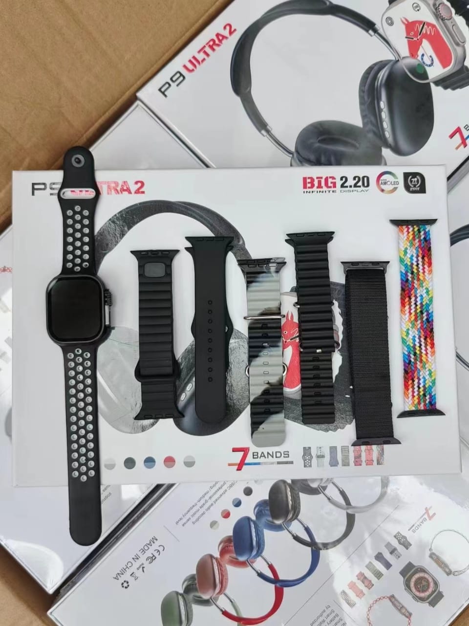 9-in-1 Ultra 2 smartwatch with 7 interchangeable straps and P9 Bluetooth headphones