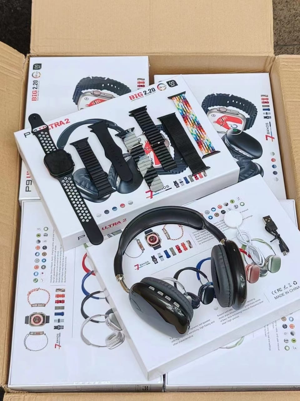 9-in-1 Ultra 2 smartwatch with 7 interchangeable straps and P9 Bluetooth headphones