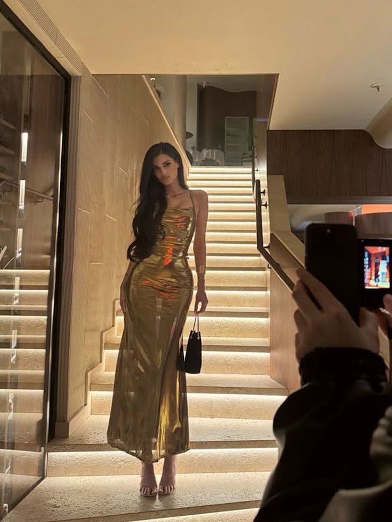 Cngirl spicy girl showcases her temperament and personality with a sexy split gold off shoulder and backless camisole dress