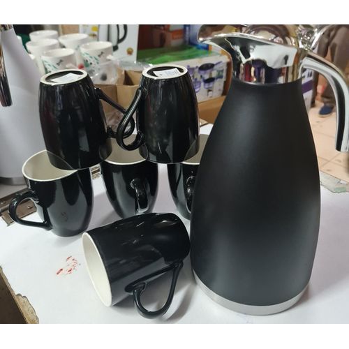 📌Price Drop❗️❗️Classy Flask Set available🔥🔥🥳.    7Pcs Quality Tea/Coffee Set 6 Mugs With 1 Thermo Flask.Unbreakable 2l Thermos
6pcs Plain black Tea/Coffee Mugs 
For coffee or tea
Idea for commerci