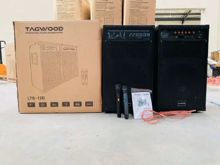 NEW TAGWOOD LTS-12D OUTDOOR SPEAKER WITH FM/BLUETOOTH.HAS TWO WIRELESS MICROPHONES