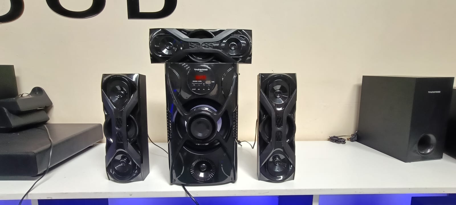 Tagwood LS-631M 3.1CH Subwoofer System with Bluetooth, FM, USB & SD, plus 2 satellite speakers & remote — ideal for home cinema & music.