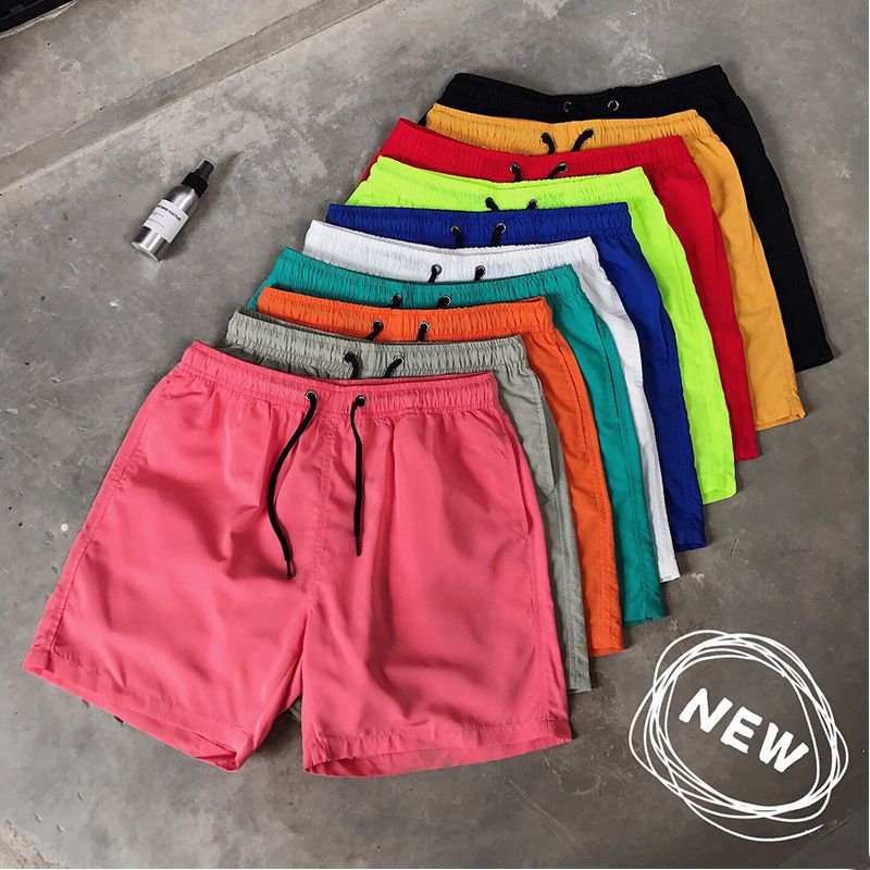 Ice Silk men's beach shorts Light breathable Summer sports shorts Candy color Surf Swimming loose sports shorts Extra large size