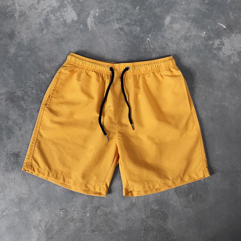 Ice Silk men's beach shorts Light breathable Summer sports shorts Candy color Surf Swimming loose sports shorts Extra large size