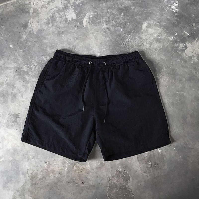 Ice Silk men's beach shorts Light breathable Summer sports shorts Candy color Surf Swimming loose sports shorts Extra large size