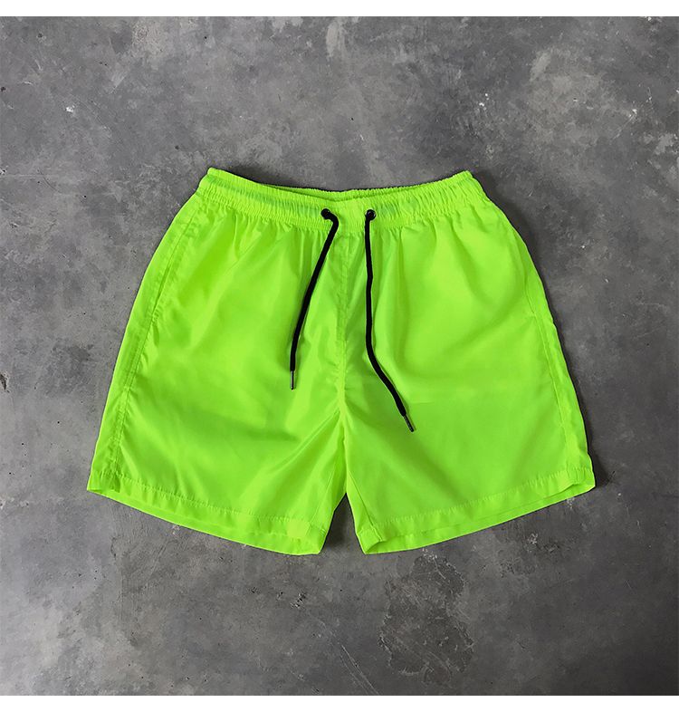 Ice Silk men's beach shorts Light breathable Summer sports shorts Candy color Surf Swimming loose sports shorts Extra large size