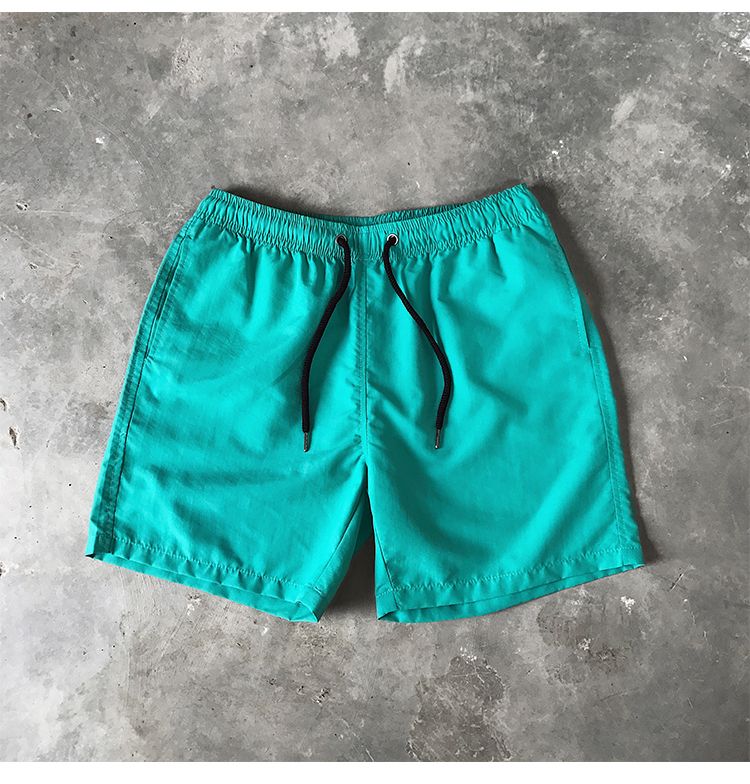 Ice Silk men's beach shorts Light breathable Summer sports shorts Candy color Surf Swimming loose sports shorts Extra large size