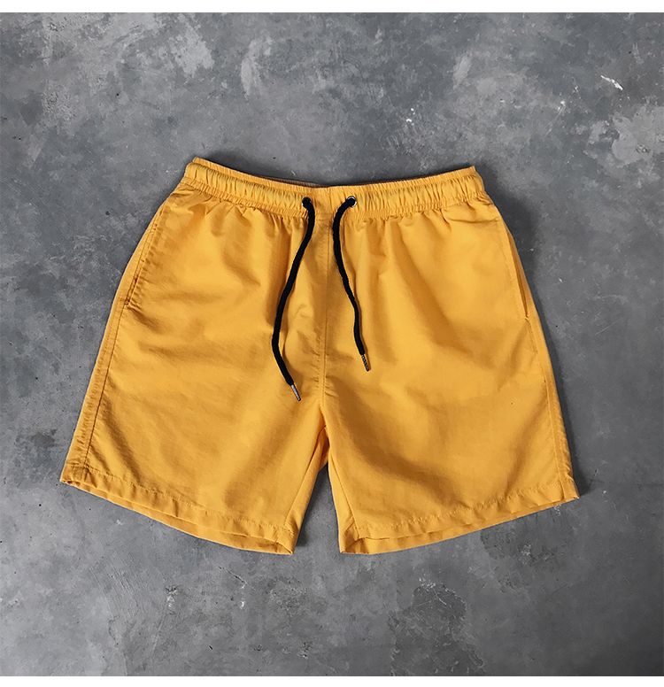 Ice Silk men's beach shorts Light breathable Summer sports shorts Candy color Surf Swimming loose sports shorts Extra large size