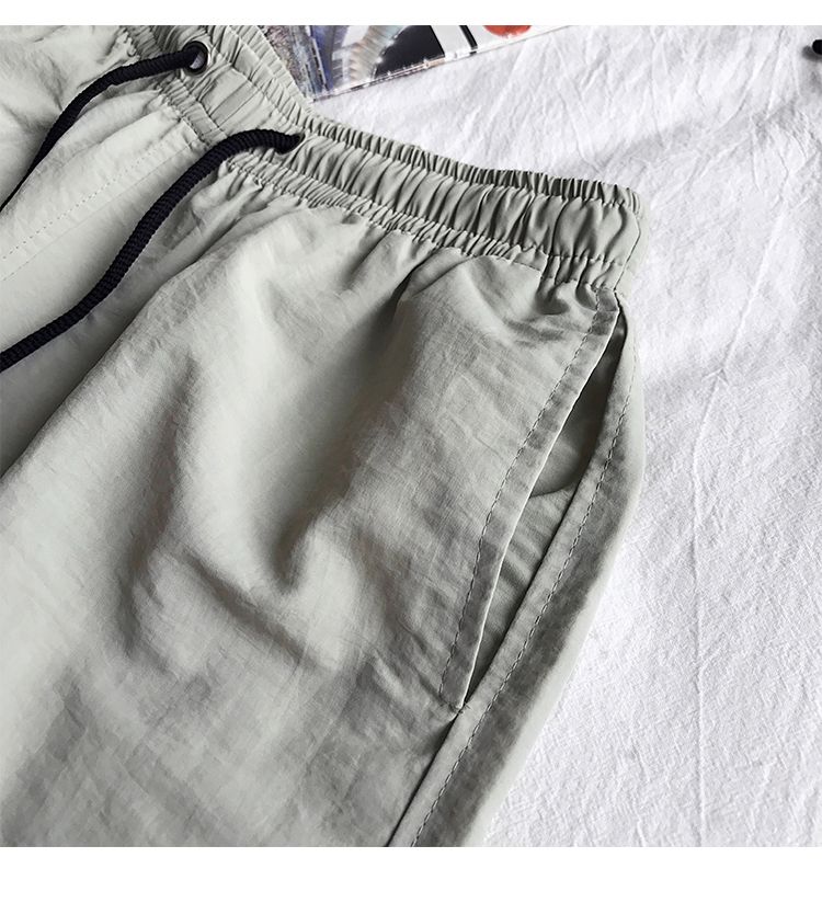 Ice Silk men's beach shorts Light breathable Summer sports shorts Candy color Surf Swimming loose sports shorts Extra large size