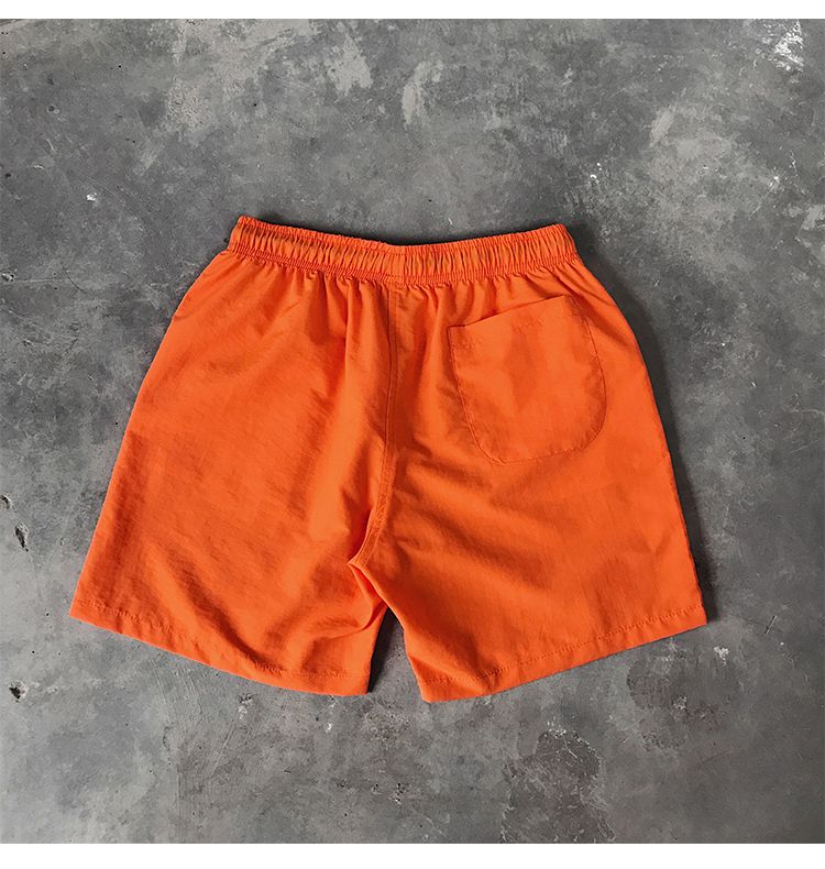 Ice Silk men's beach shorts Light breathable Summer sports shorts Candy color Surf Swimming loose sports shorts Extra large size