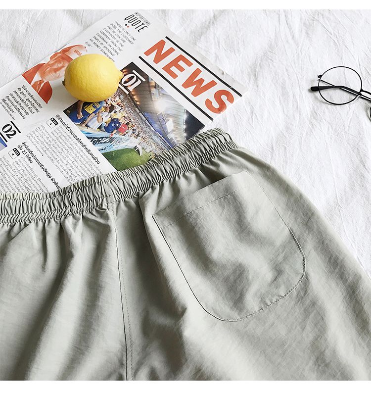 Ice Silk men's beach shorts Light breathable Summer sports shorts Candy color Surf Swimming loose sports shorts Extra large size