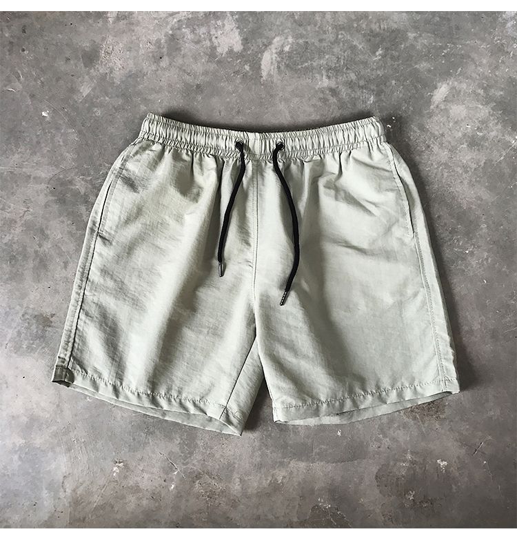 Ice Silk men's beach shorts Light breathable Summer sports shorts Candy color Surf Swimming loose sports shorts Extra large size