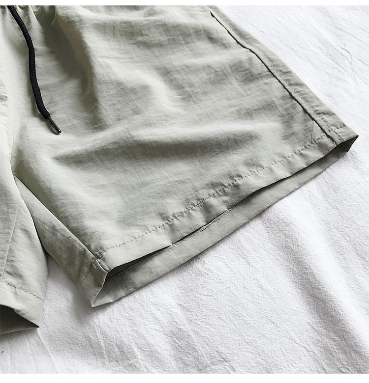 Ice Silk men's beach shorts Light breathable Summer sports shorts Candy color Surf Swimming loose sports shorts Extra large size