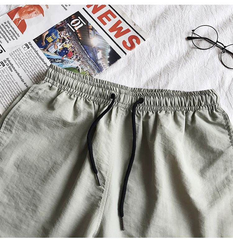 Ice Silk men's beach shorts Light breathable Summer sports shorts Candy color Surf Swimming loose sports shorts Extra large size