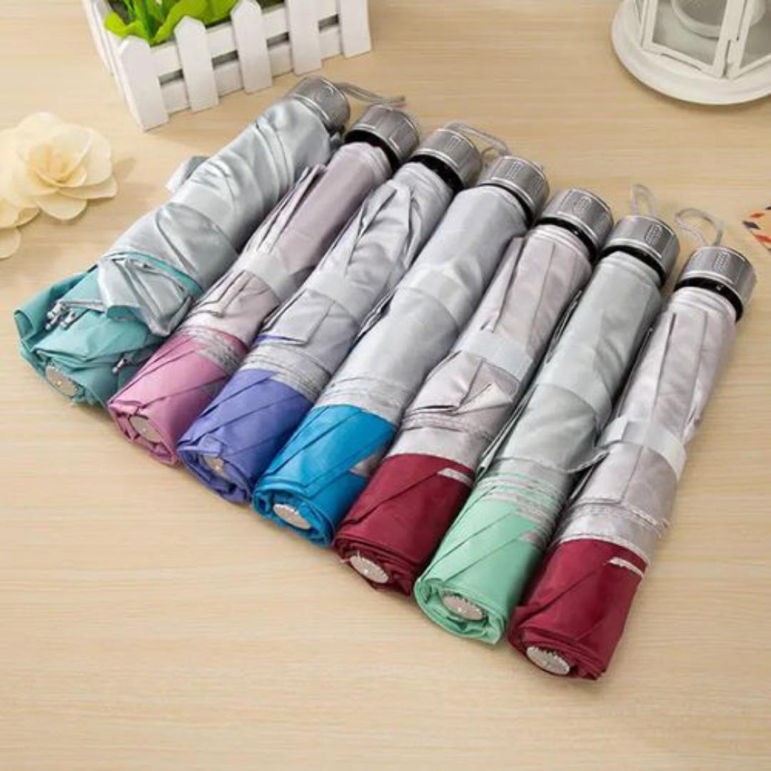 Pocket umbrella foldable bag UV-resistant solid color folding umbrella for sunny and rainy days