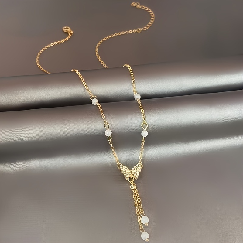 New trendy pearl necklace for women, niche cold style necklace, high-end light luxury zircon butterfly clavicle necklace