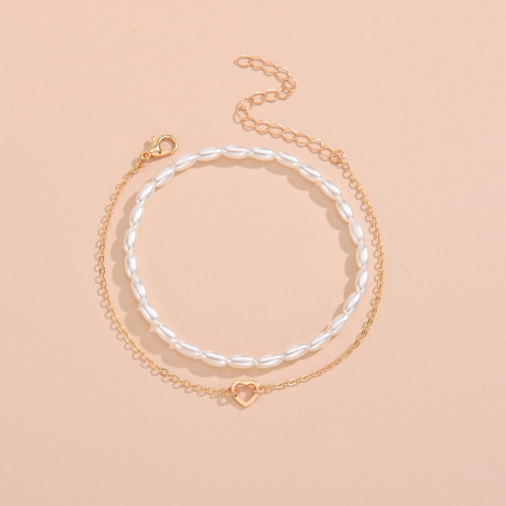 Fashion Summer Beach Vacation Wind Alloy Love Rice Grain Pearl Elastic Women'S Anklet 2-Piece Set