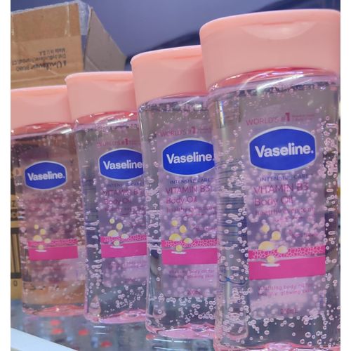 Vaseline Vitamin B3 Radiant Body Oil With Pure Cocoa Butter - 200ml - Replenishing Oils for Healthy Glowing Skin 100 Percent Pure Cocoa Butter Ultimate Skin Care