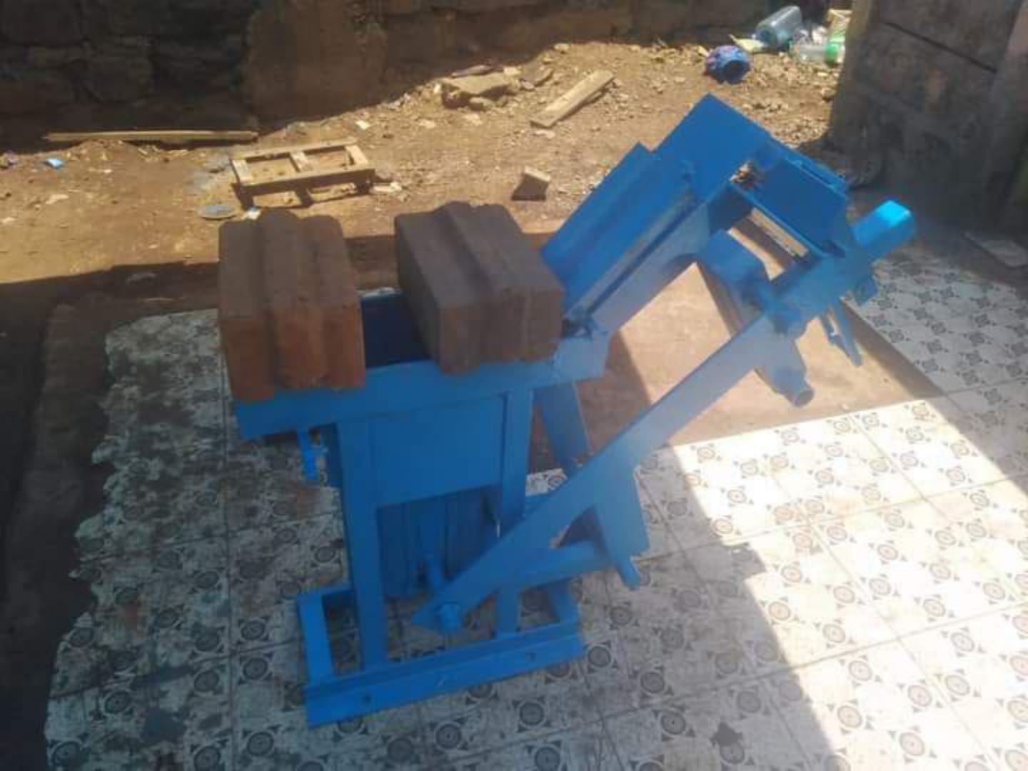 Interlocking block making machine