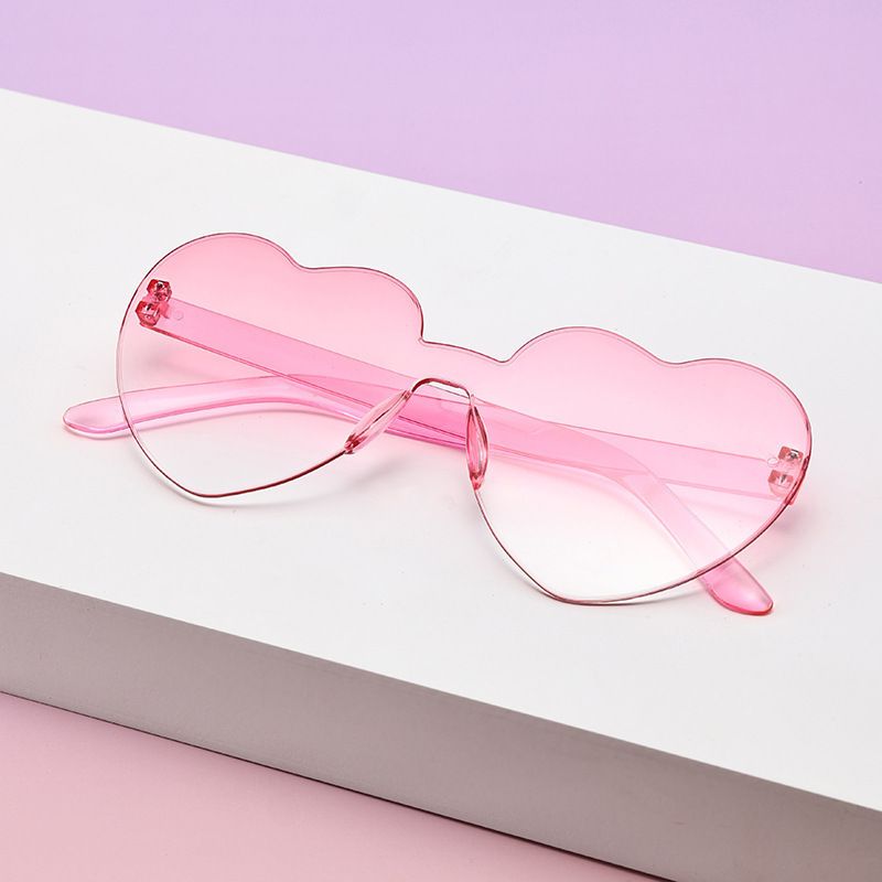 Borderless heart-shaped conjoined children's sunglasses jelly love baby sunglasses European and American candy colored peach heart children's glasses
