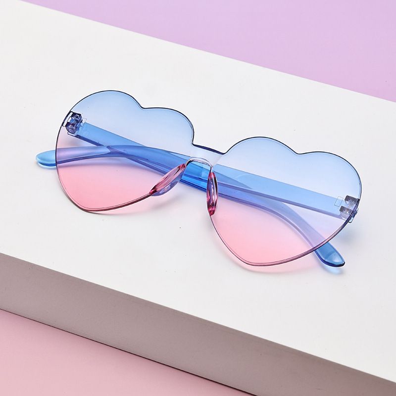 Borderless heart-shaped conjoined children's sunglasses jelly love baby sunglasses European and American candy colored peach heart children's glasses