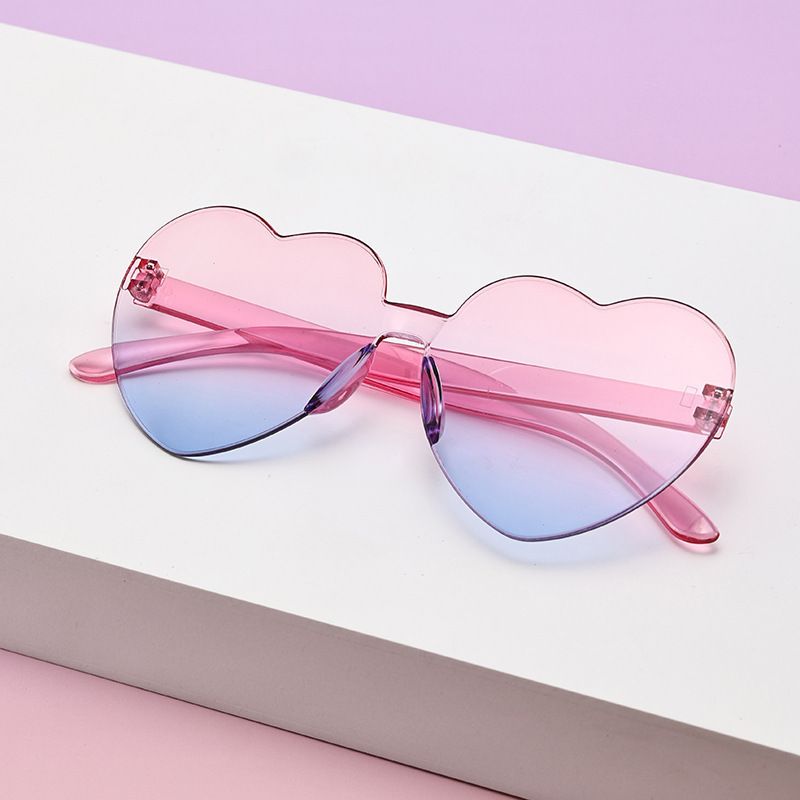 Borderless heart-shaped conjoined children's sunglasses jelly love baby sunglasses European and American candy colored peach heart children's glasses