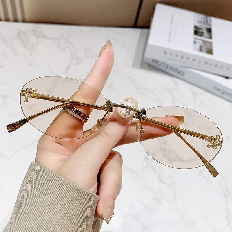 New letter F frameless sunglasses with diamond inlaid oval frame fashion sunglasses European and American trend small frame decoration sunscreen glasses