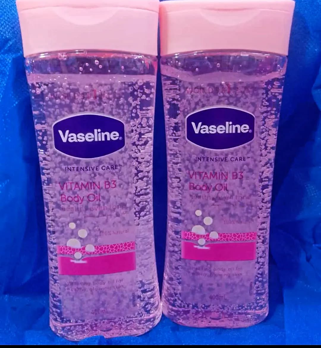 Vaseline VITAMIN B3 Intensive Care  Body Oil 400ml Glowing Skin 3 As Picture Count Body Gel Oil Body Oil Made with 100% Pure Cocoa Butter + Replenishing Oils 6.8oz