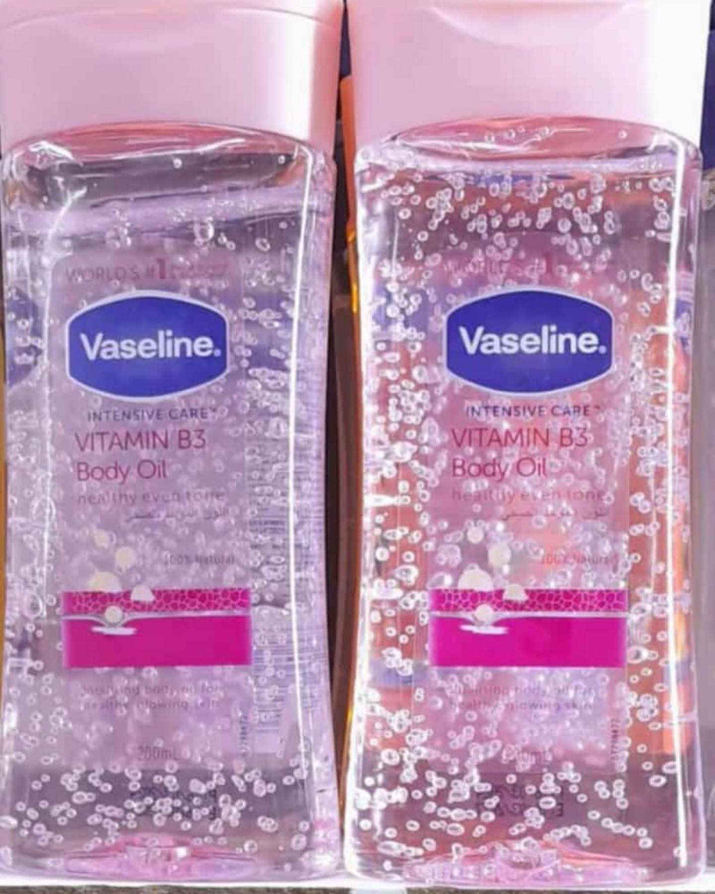 Vaseline VITAMIN B3 Intensive Care  Body Oil 400ml Glowing Skin 3 As Picture Count Body Gel Oil Body Oil Made with 100% Pure Cocoa Butter + Replenishing Oils 6.8oz