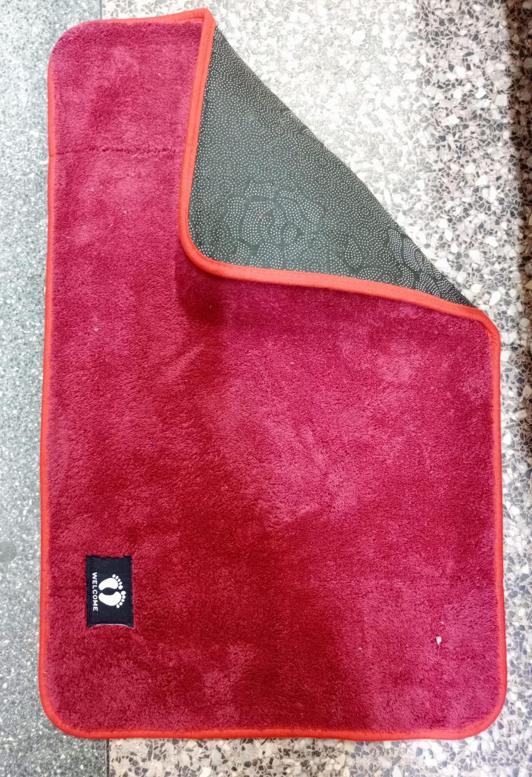 welcome doormat designed to keep your entryway clean and inviting. Made from high-quality material with a firm grip base, it effectively traps dirt and moisture while adding a warm, welcoming touch to