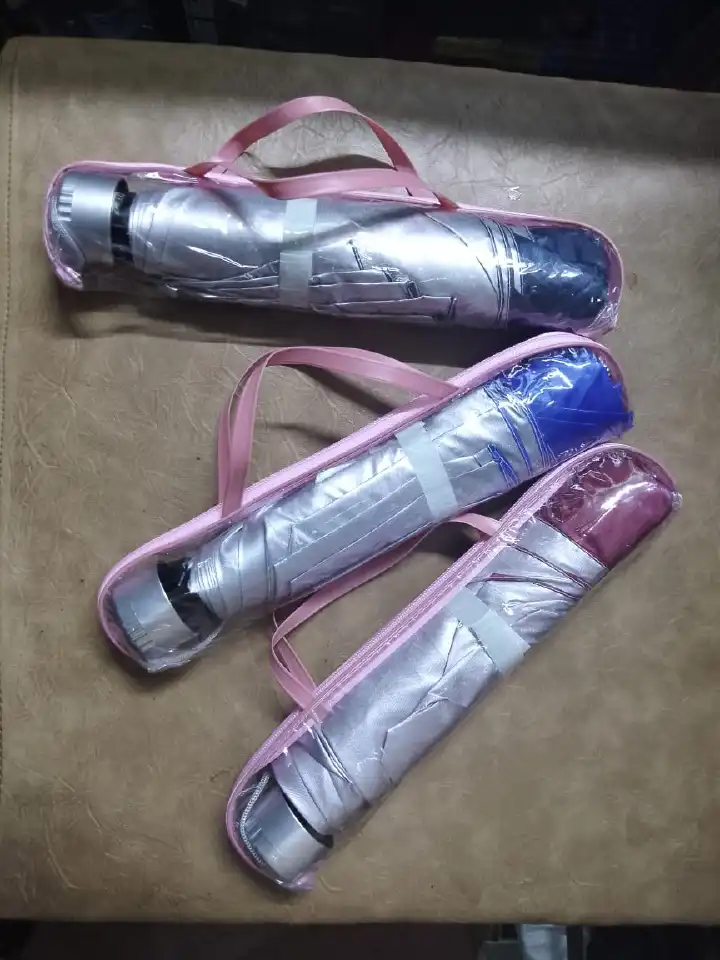 Pocket umbrella foldable bag UV-resistant solid color folding umbrella for sunny and rainy days